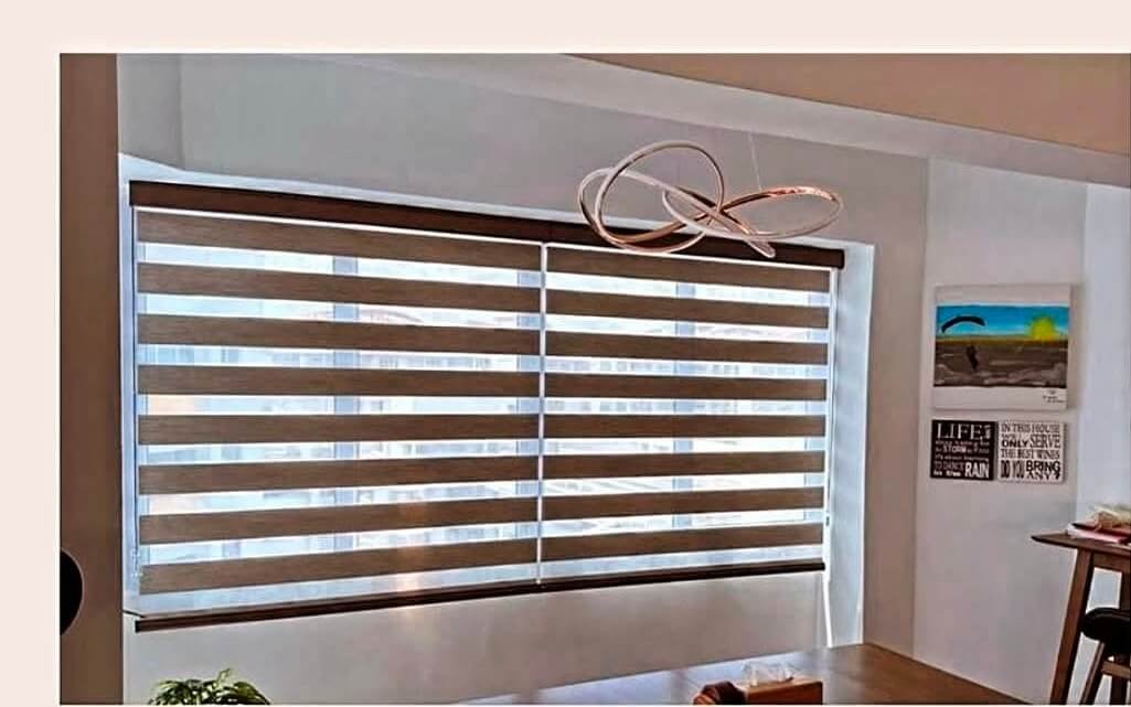 Korean combi blinds with sheer and opaque panels in a Singapore bedroom