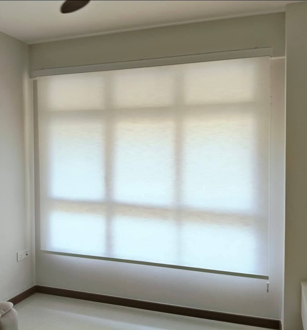 Ripple fold curtains on custom tracks in a Singapore living room